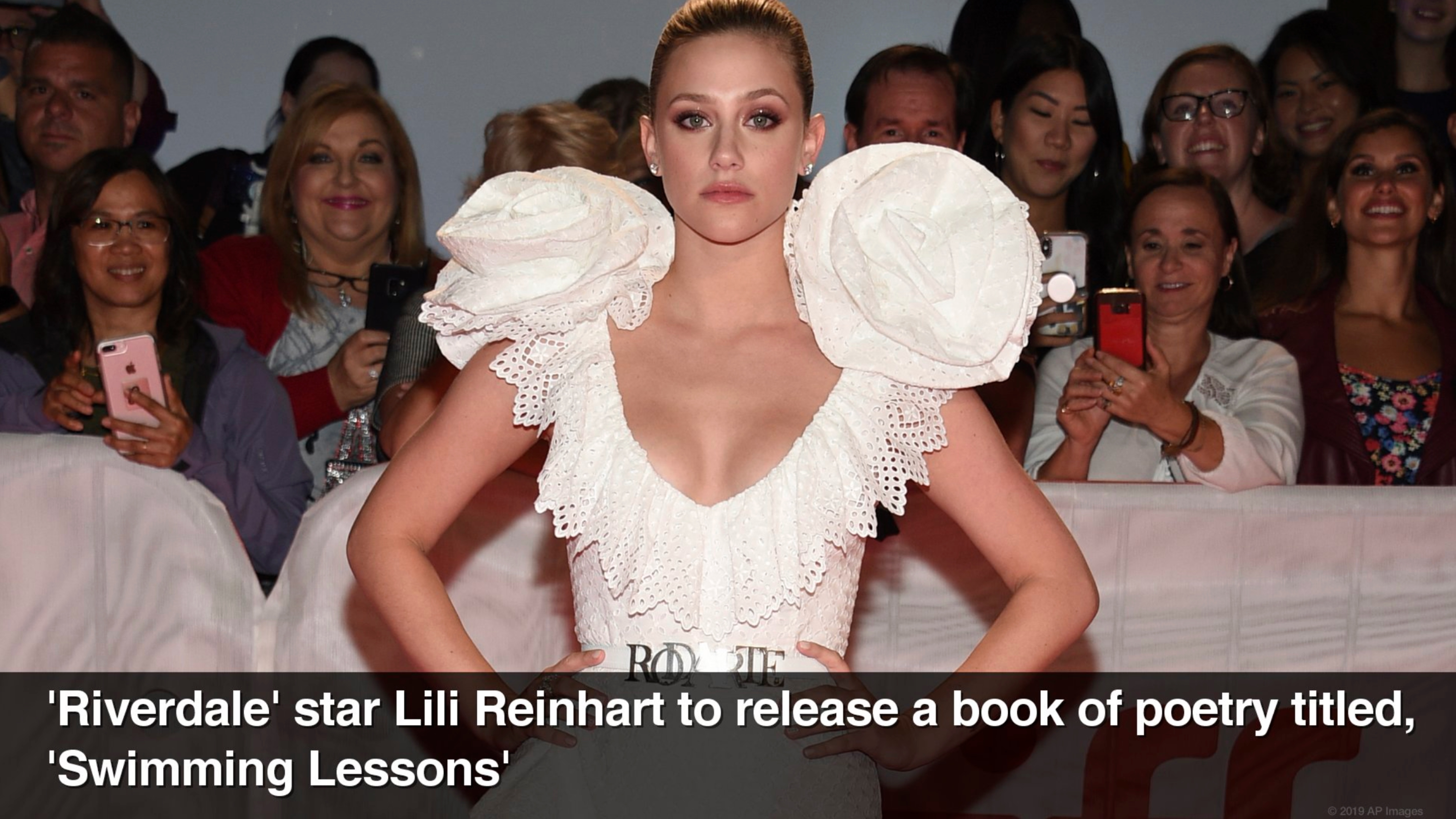 Large photo and celebrity news headline highlighting News in Pictures App