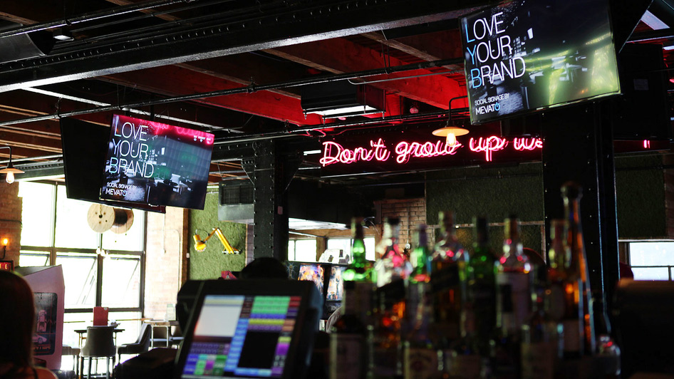 neon and digital signage in a bar