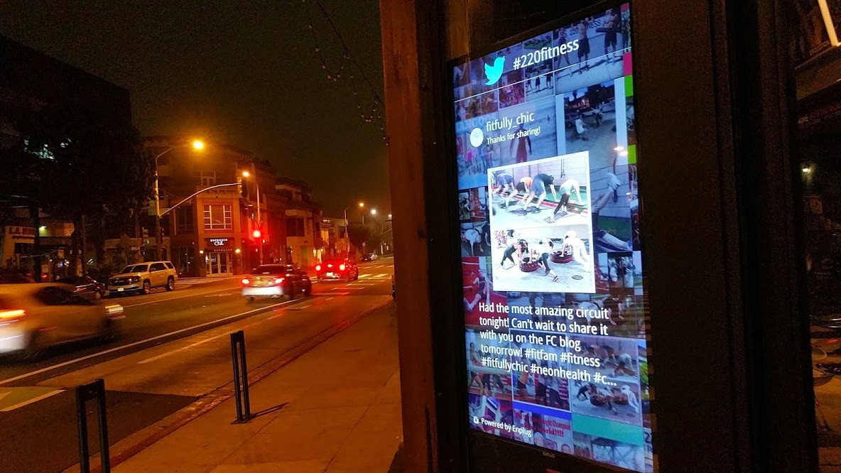 Outdoor digital signage promoting gym